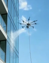 GevelspuitenReinigings- en coatingdrone